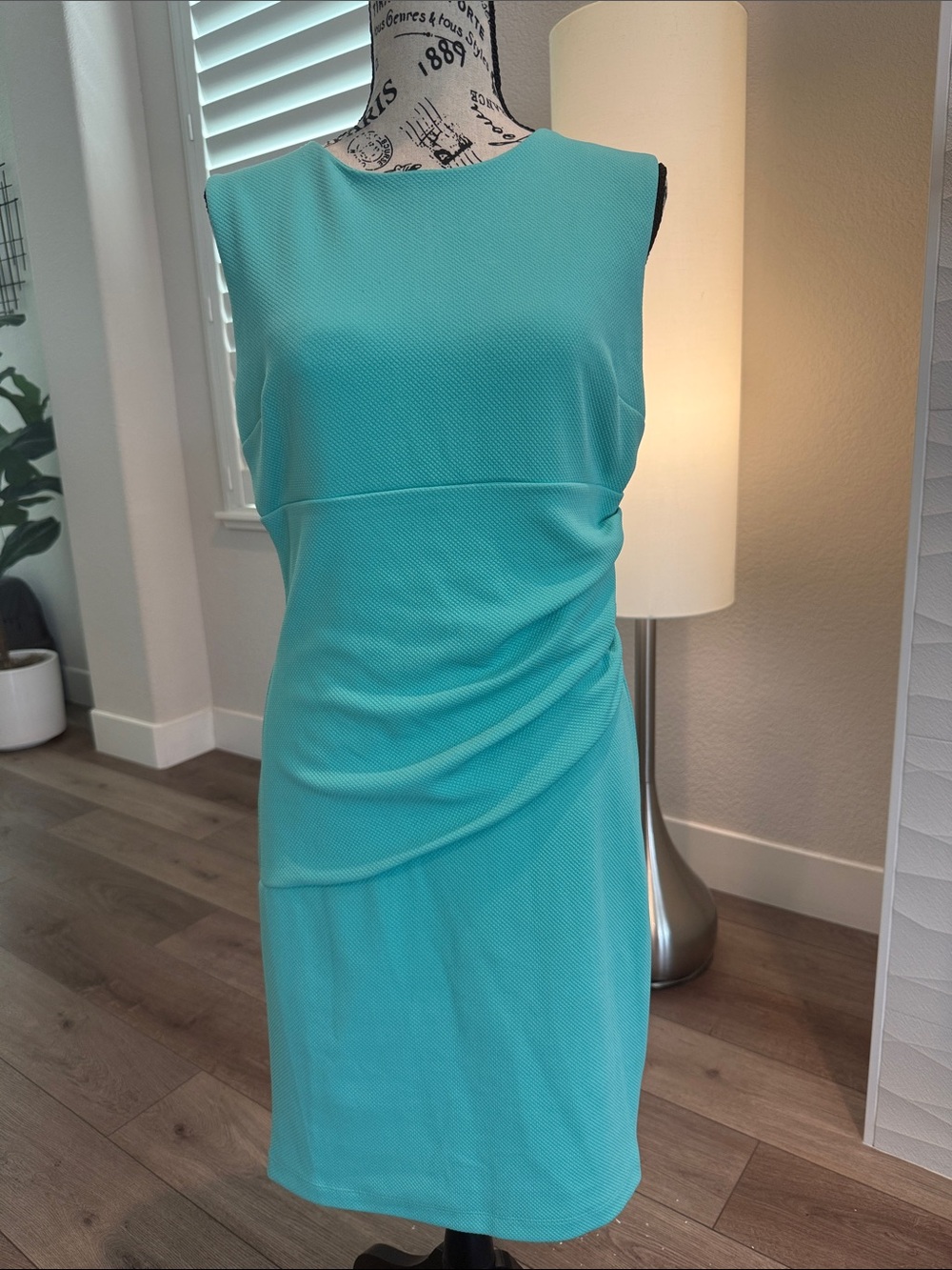 B. Smart Turquoise Sleeveless Sheath Midi Dress